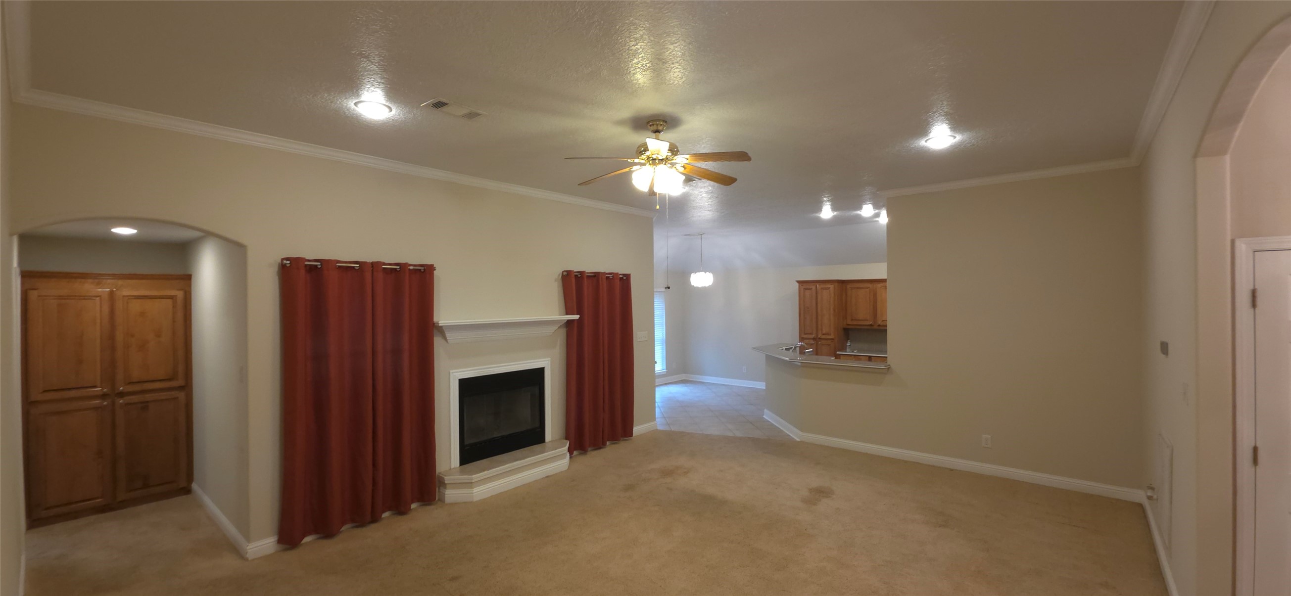 215 Bridgeview Drive Onalaska, TX 77360 - Photo 5 of 29 a view of a kitchen with a sink and a refrigerator