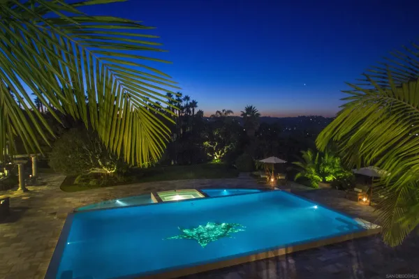 a view of an outdoor space and swimming pool
