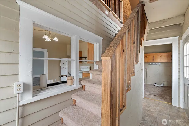 a bathroom with a sink and a large mirror