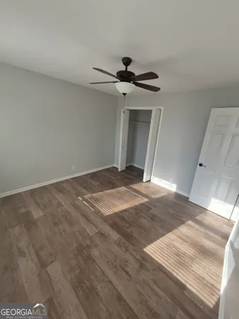 a view of a big room with wooden floor
