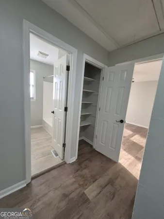 an empty room with a door
