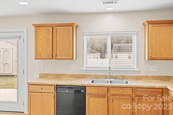 264 Ranlo Avenue Gastonia, NC 28054 - Photo 15 of 44 a kitchen with a sink and a window