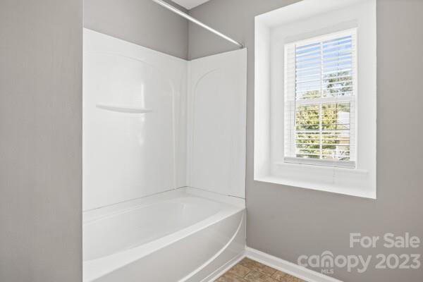 264 Ranlo Avenue Gastonia, NC 28054 - Photo 25 of 44 a white bath tub sitting next to a window