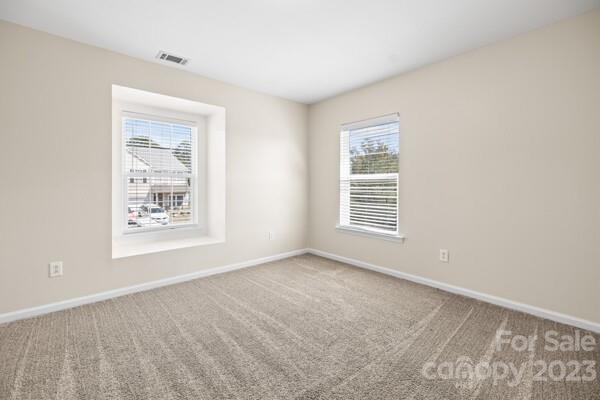 264 Ranlo Avenue Gastonia, NC 28054 - Photo 26 of 44 a view of an empty room with a window