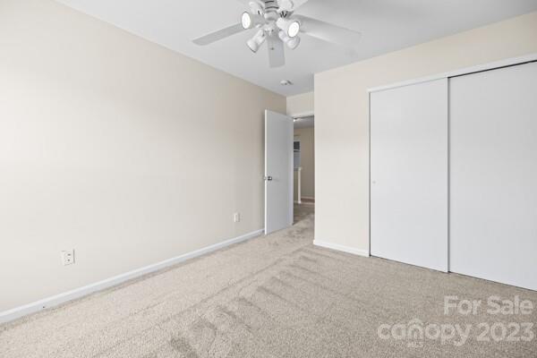 264 Ranlo Avenue Gastonia, NC 28054 - Photo 30 of 44 a view of an empty room with chandelier fan