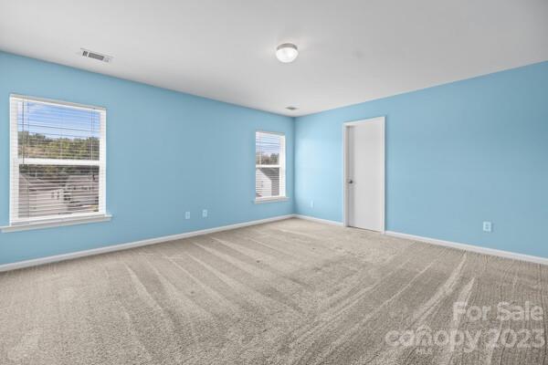 264 Ranlo Avenue Gastonia, NC 28054 - Photo 31 of 44 a view of an empty room with a window