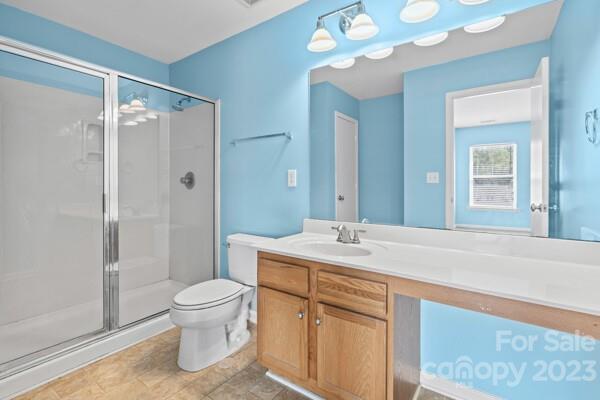 264 Ranlo Avenue Gastonia, NC 28054 - Photo 34 of 44 a bathroom with a sink a toilet and shower