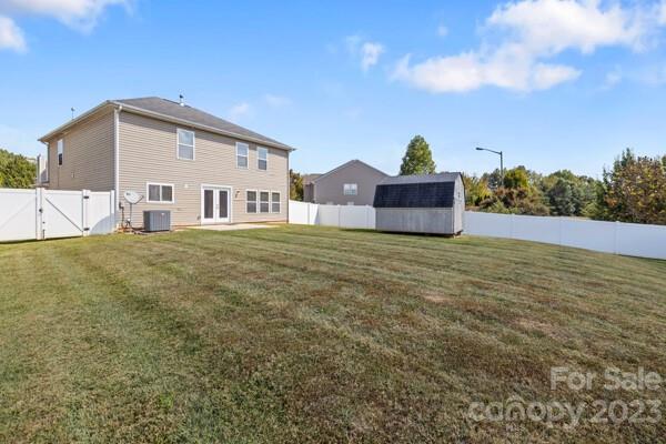 264 Ranlo Avenue Gastonia, NC 28054 - Photo 42 of 44 a big house with a big yard and large trees