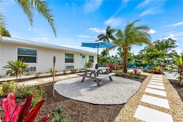 swimming pool view with a sitting space