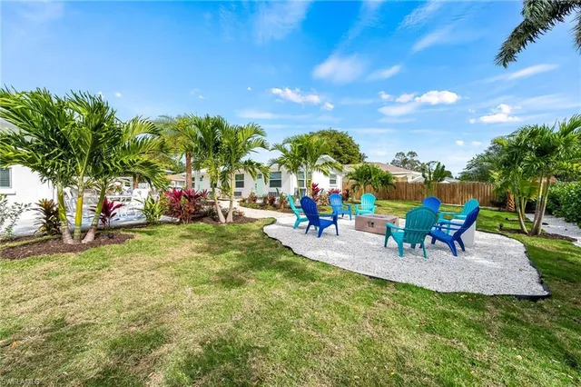 a view of a park with swings and slides