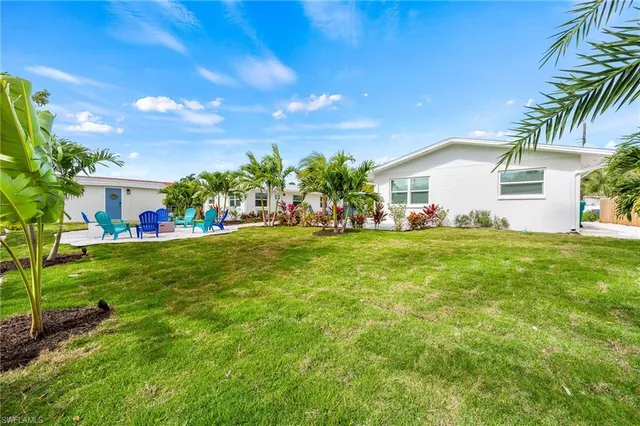a front view of house with garden