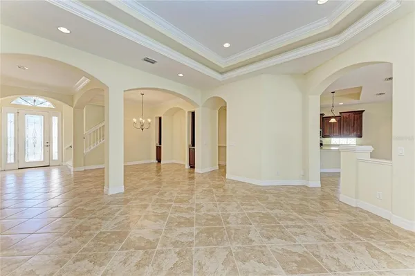 a large kitchen with stainless steel appliances lots of counter space