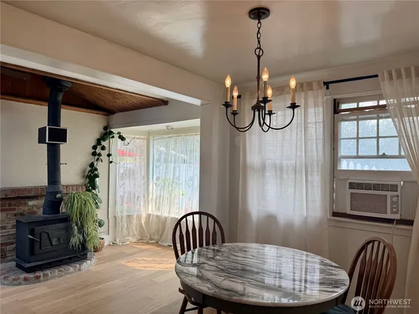 a view of a livingroom with furniture and windows
