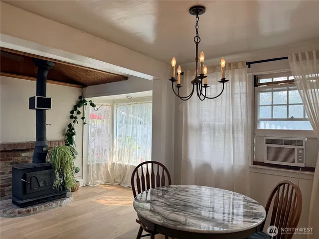 a view of a livingroom with furniture and windows