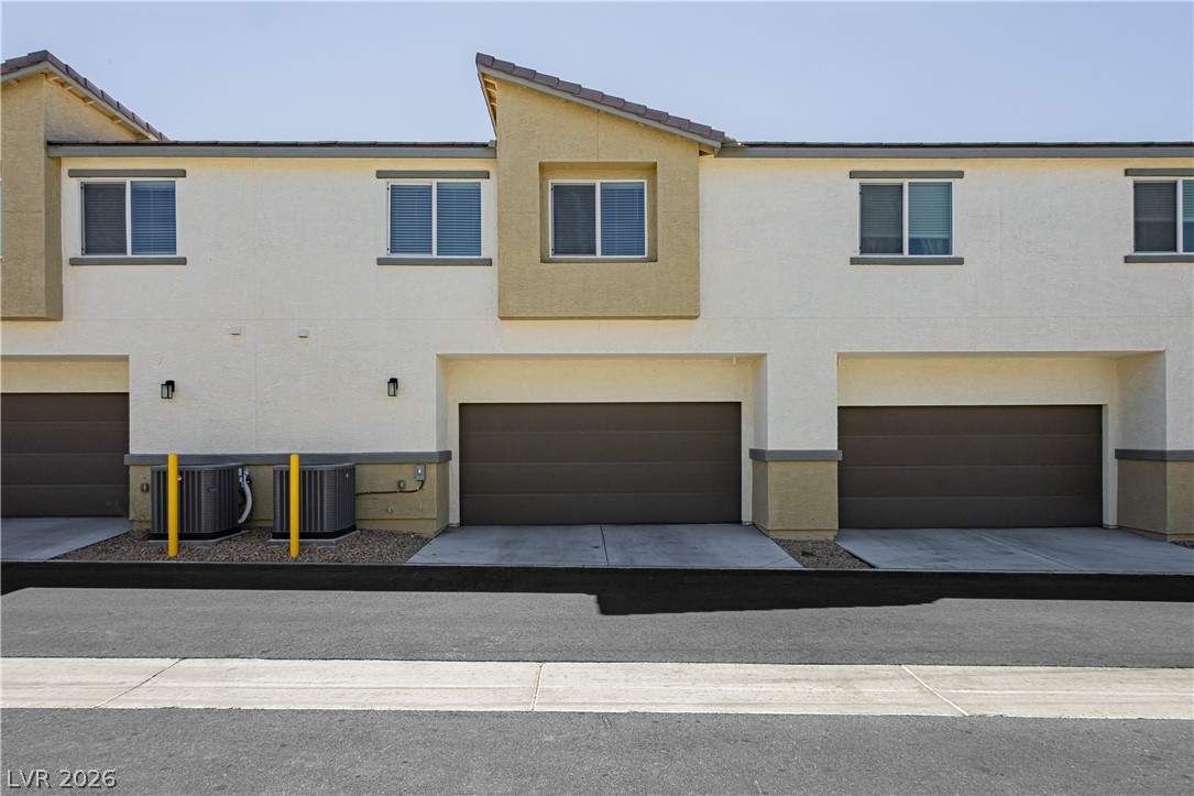 12369 Golden Wreath Road, Unit 2 Las Vegas, NV 89183 - Photo 19 of 19 Clean lines and modern design define the garages of this multi-unit residence.