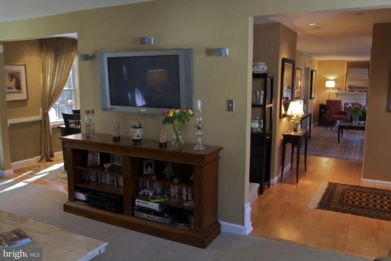 12300 Coleraine Court Reston, VA 20191 - Photo 3 of 28 a living room with furniture and a fireplace