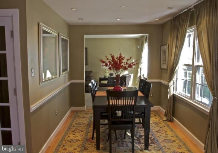 12300 Coleraine Court Reston, VA 20191 - Photo 4 of 28 a view of a dining room with furniture window and wooden floor