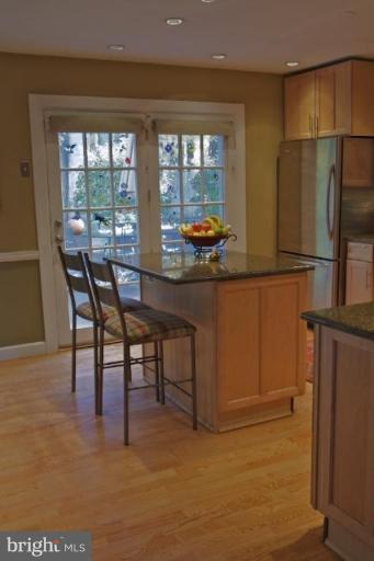12300 Coleraine Court Reston, VA 20191 - Photo 5 of 28 a view of a dining room with furniture window and outside view