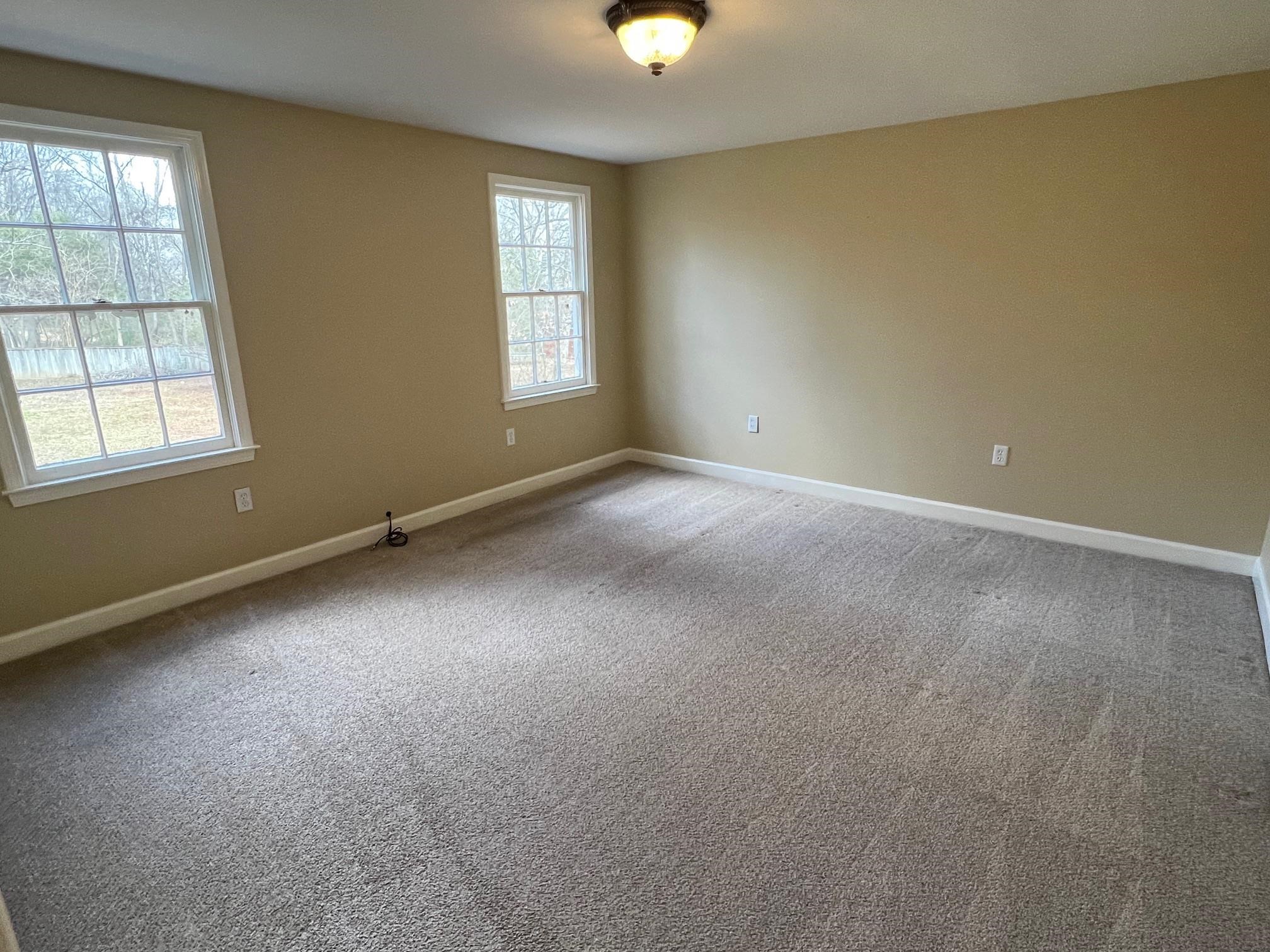 262 East Poplar Avenue Collierville, TN 38017 - Photo 14 of 19 an empty room with windows and closet