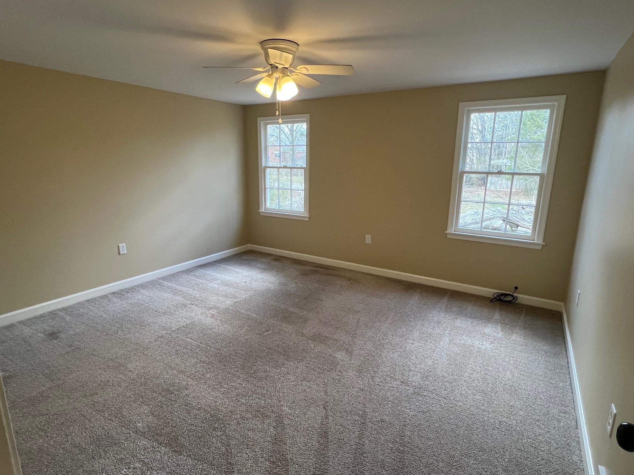 262 East Poplar Avenue Collierville, TN 38017 - Photo 16 of 19 a view of an empty room with a window
