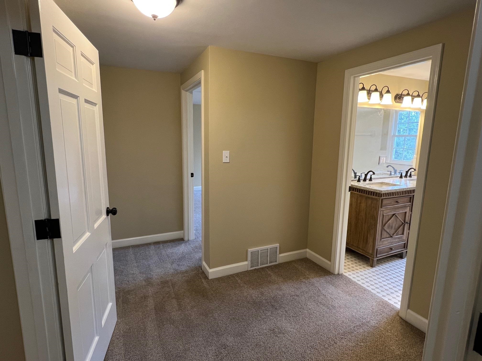 262 East Poplar Avenue Collierville, TN 38017 - Photo 17 of 19 a view of an empty room with a fireplace