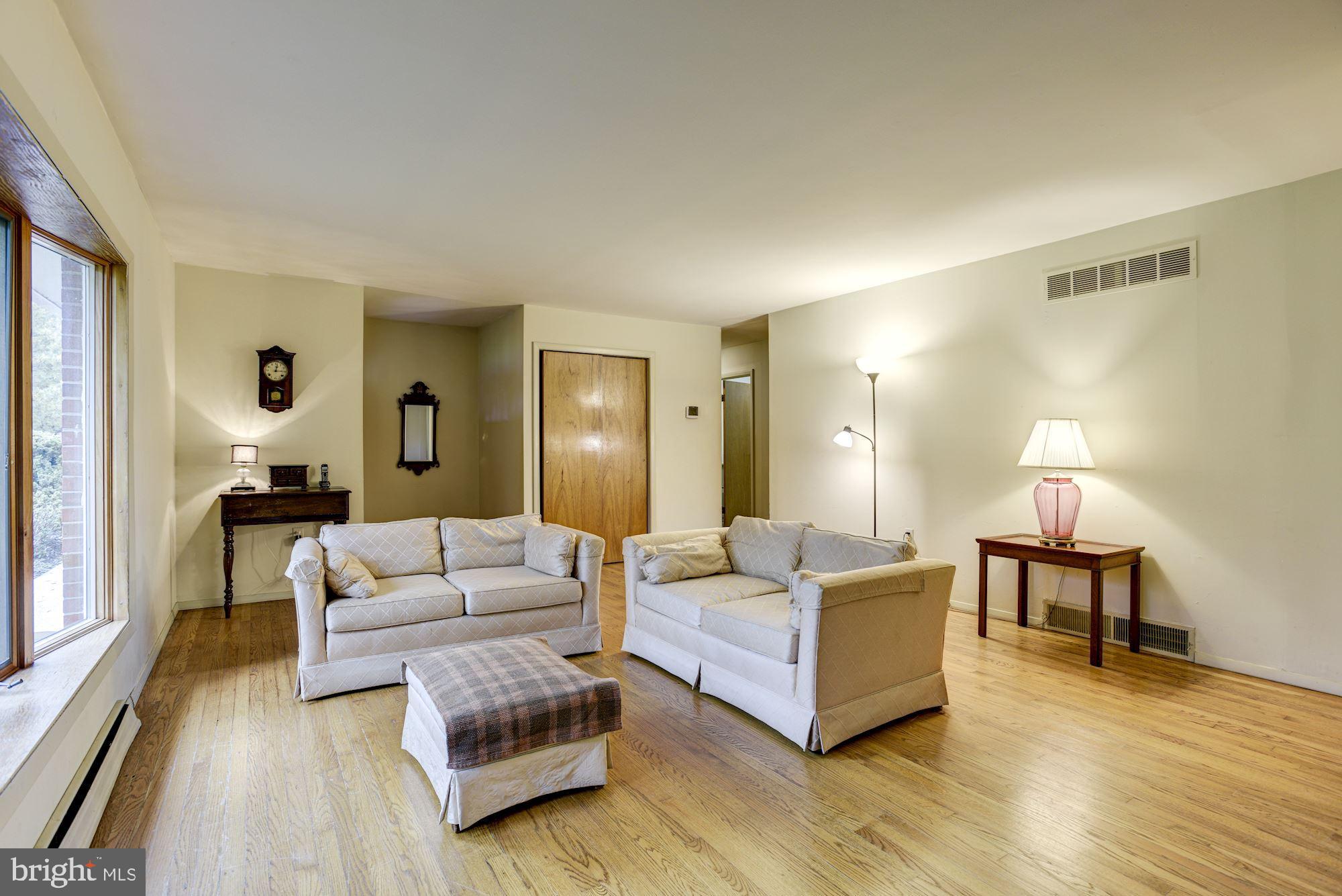 Living Room | Hardwood Floors | Bow Window