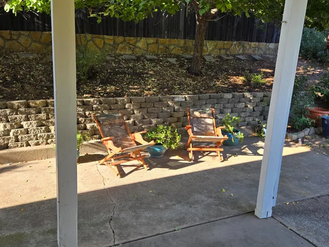a view of yard from a balcony