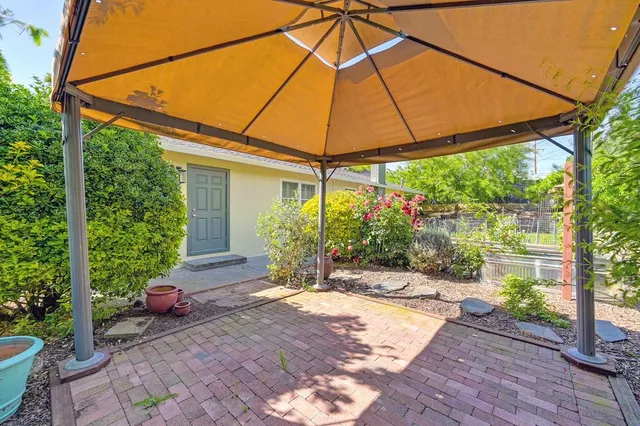 a house view with a outdoor space