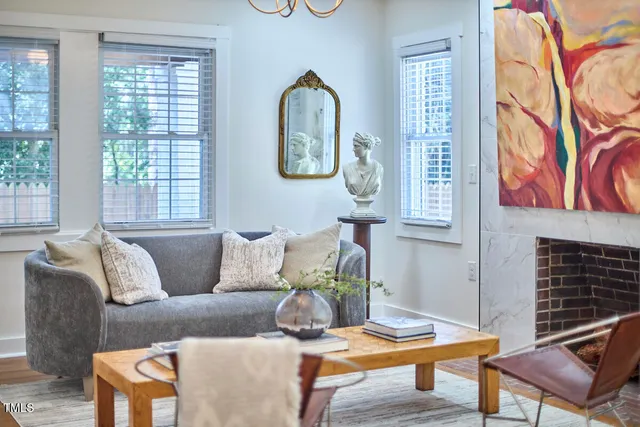 a living room with furniture and a window