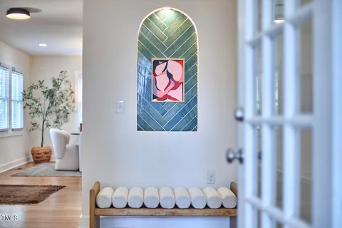 a room with toys and a painting on the wall