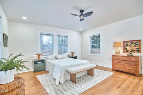 a living room with furniture and windows