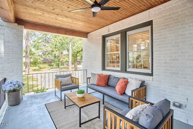 a view of a yard with swimming pool