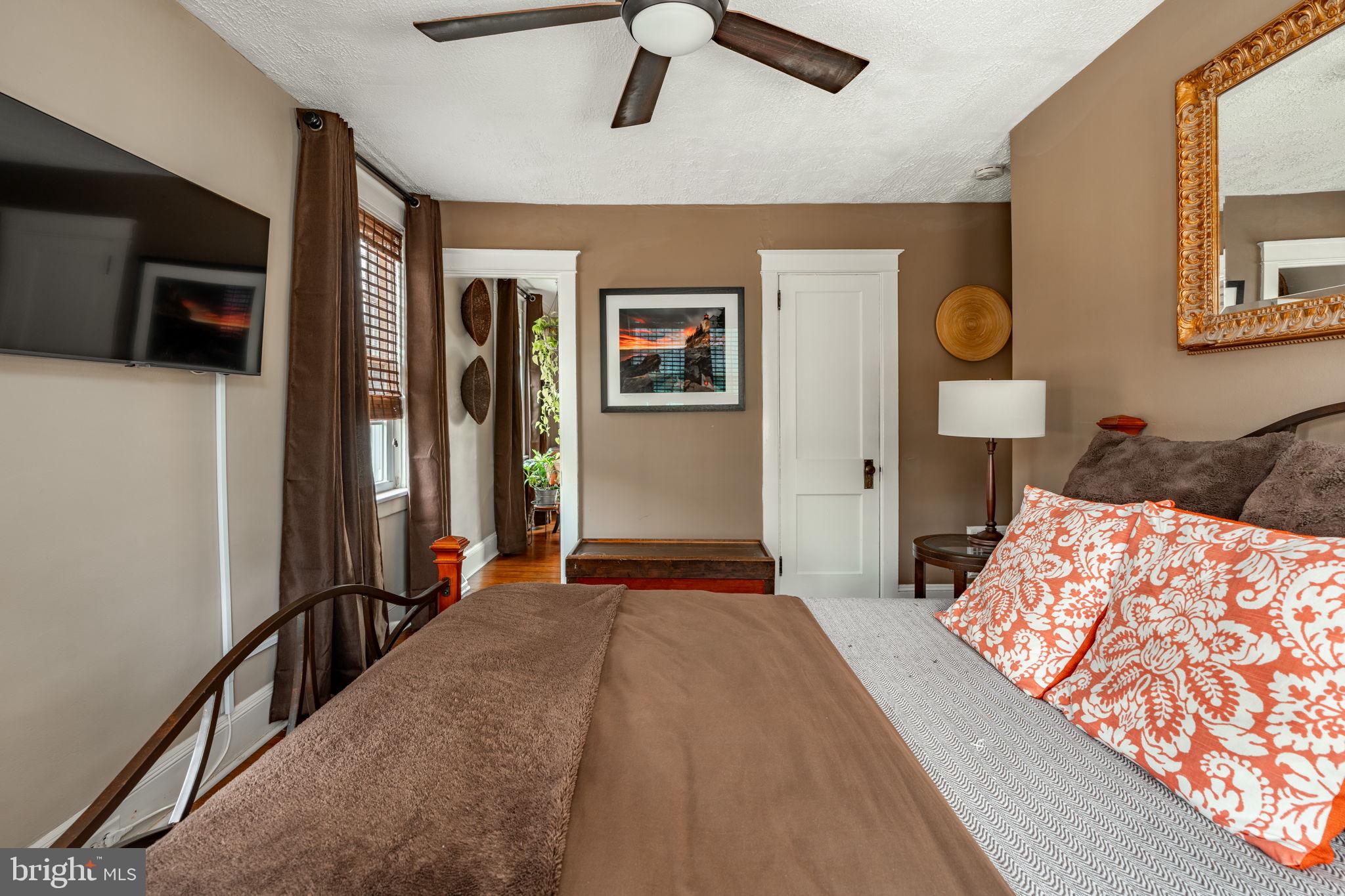 227 Ruby Street Lancaster, PA 17603 - Photo 14 of 42 a bedroom with a bed and a flat screen tv