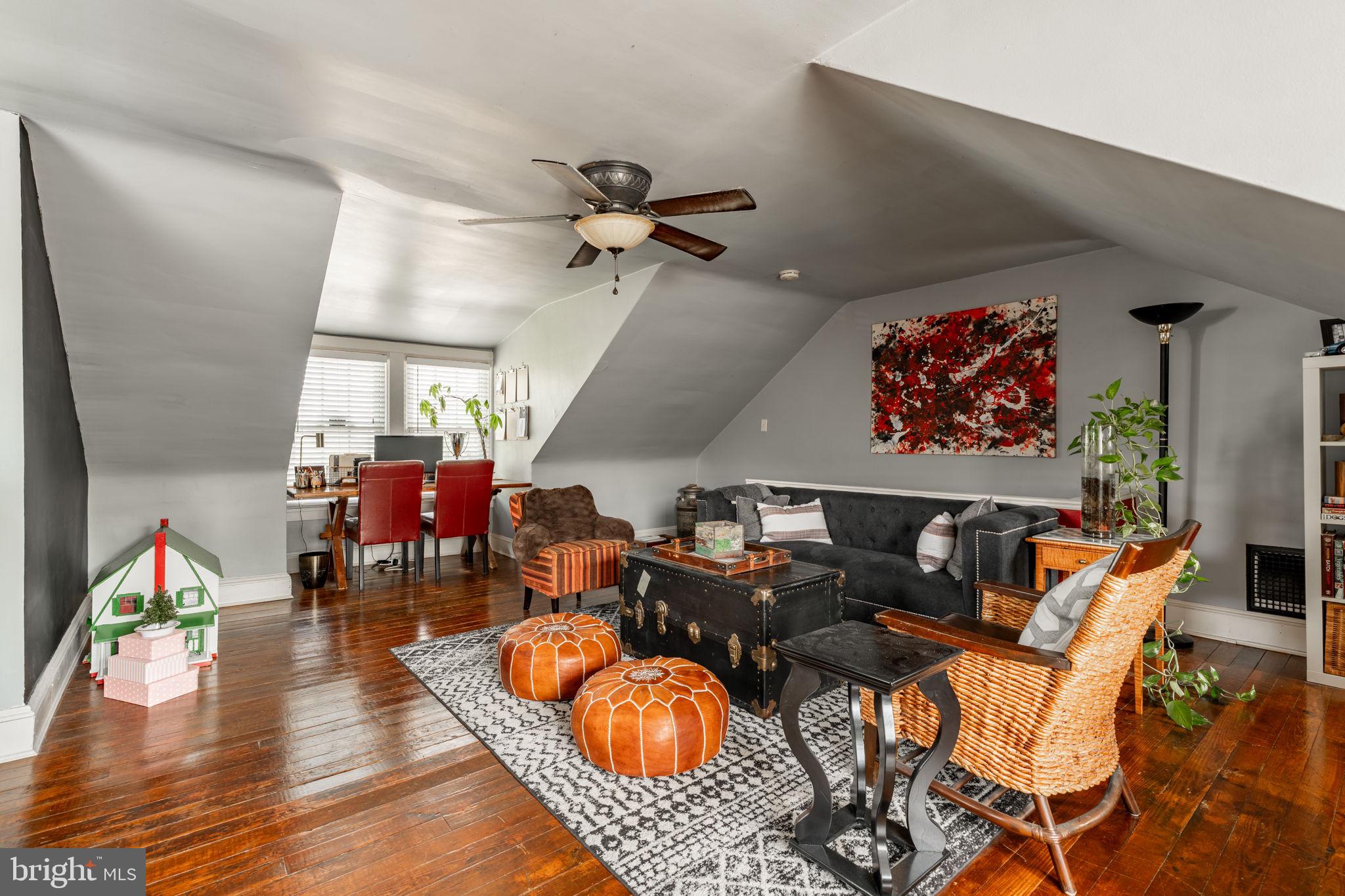 227 Ruby Street Lancaster, PA 17603 - Photo 23 of 42 a living room with furniture a rug and a chandelier
