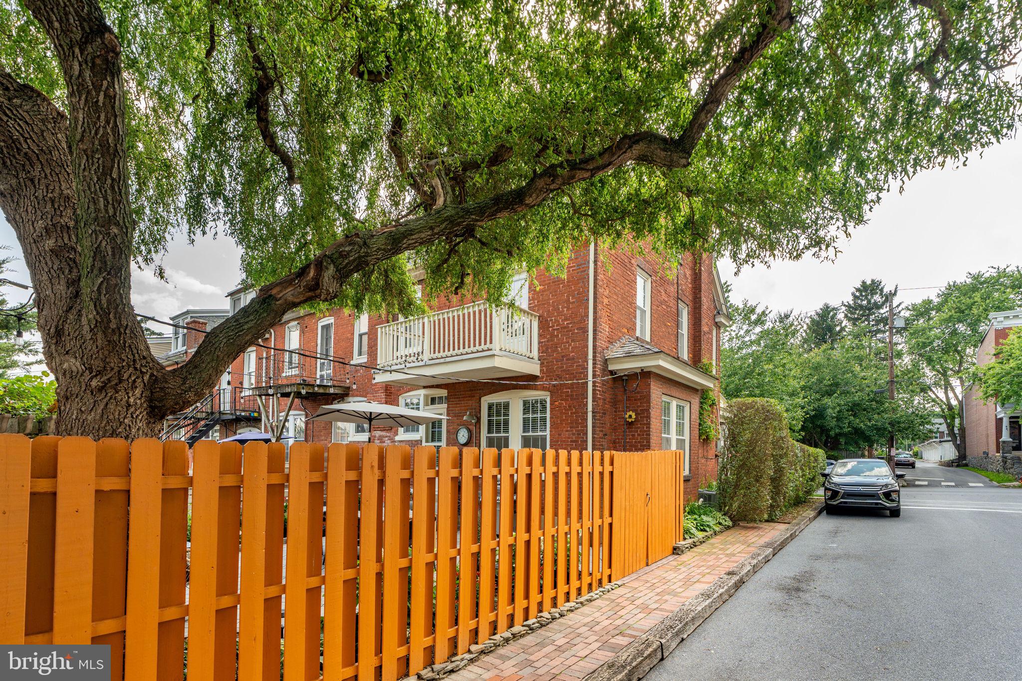 227 Ruby Street Lancaster, PA 17603 - Photo 31 of 42 a front view of a house with a tree