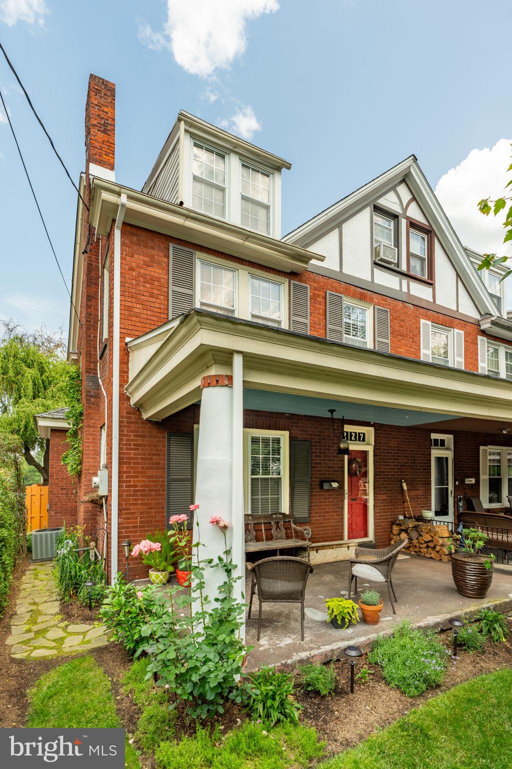 227 Ruby Street Lancaster, PA 17603 - Photo 37 of 42 a front view of a house with garden and porch