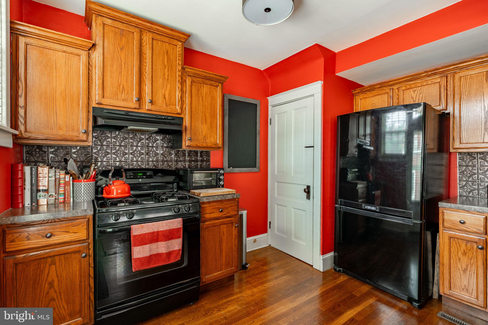 227 Ruby Street Lancaster, PA 17603 - Photo 9 of 42 a kitchen with stainless steel appliances granite countertop a refrigerator and a stove
