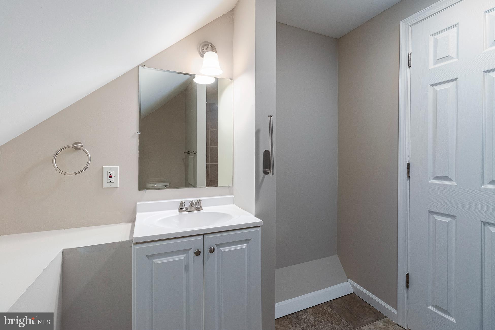 205 Starling Lane Mount Holly, NJ 08060 - Photo 16 of 21 a bathroom with a sink and a mirror