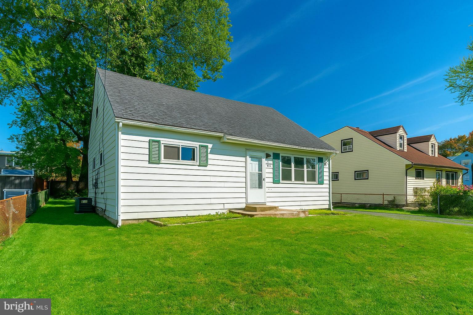 205 Starling Lane Mount Holly, NJ 08060 - Photo 2 of 21 a front view of a house with a garden