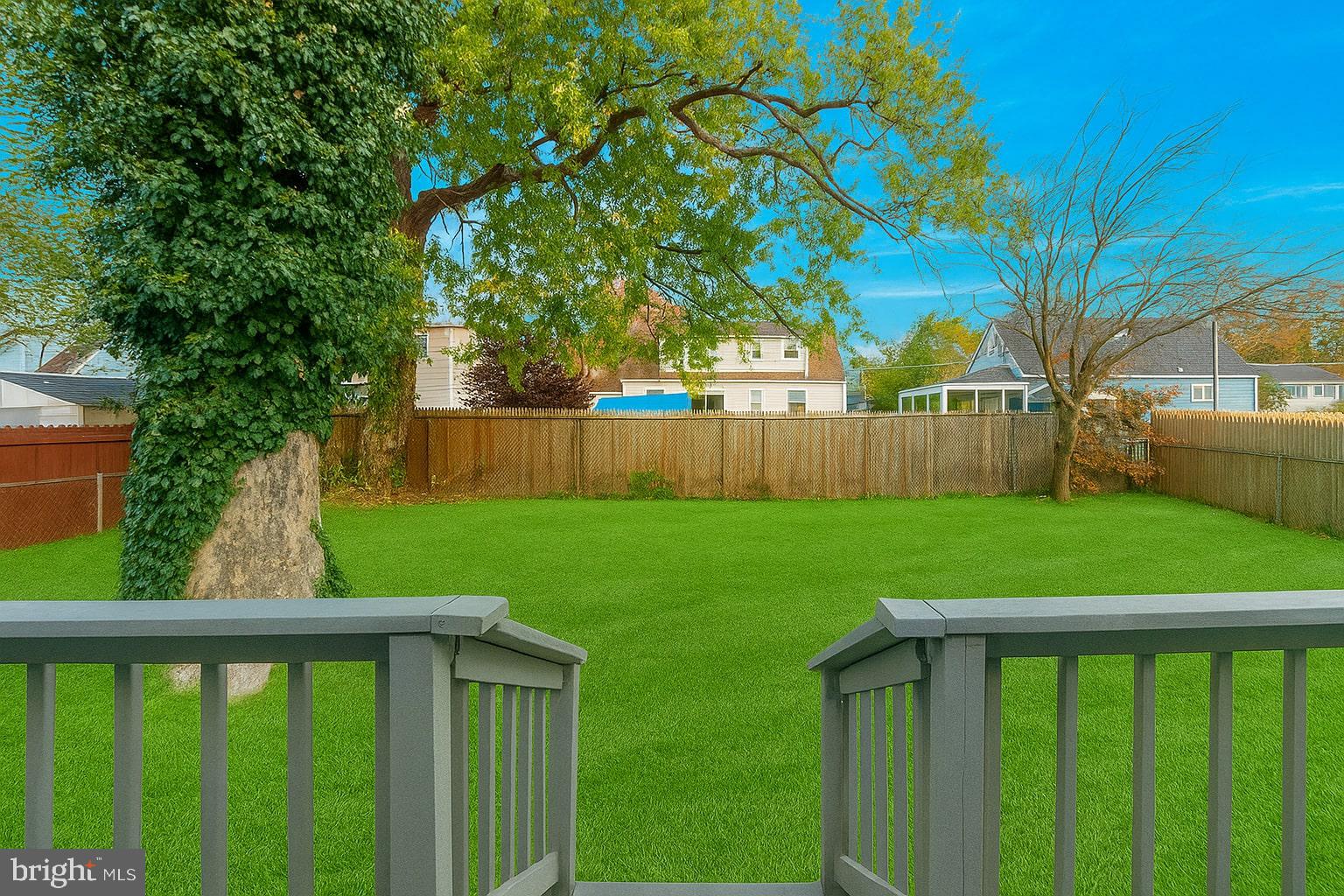 205 Starling Lane Mount Holly, NJ 08060 - Photo 21 of 21 a view of yard with green space and wooden fence
