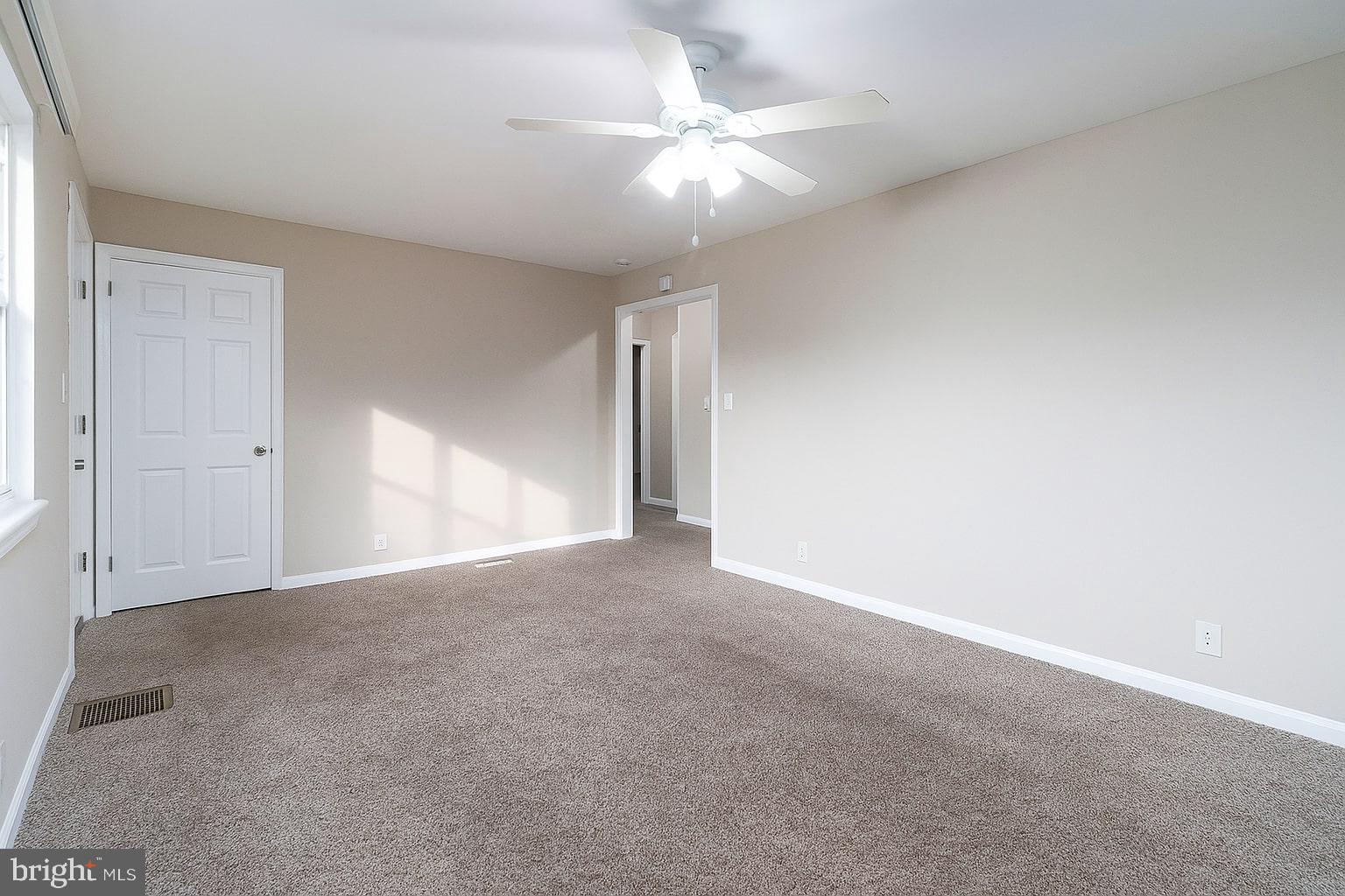 205 Starling Lane Mount Holly, NJ 08060 - Photo 5 of 21 a view of a big room with closet and a ceiling fan