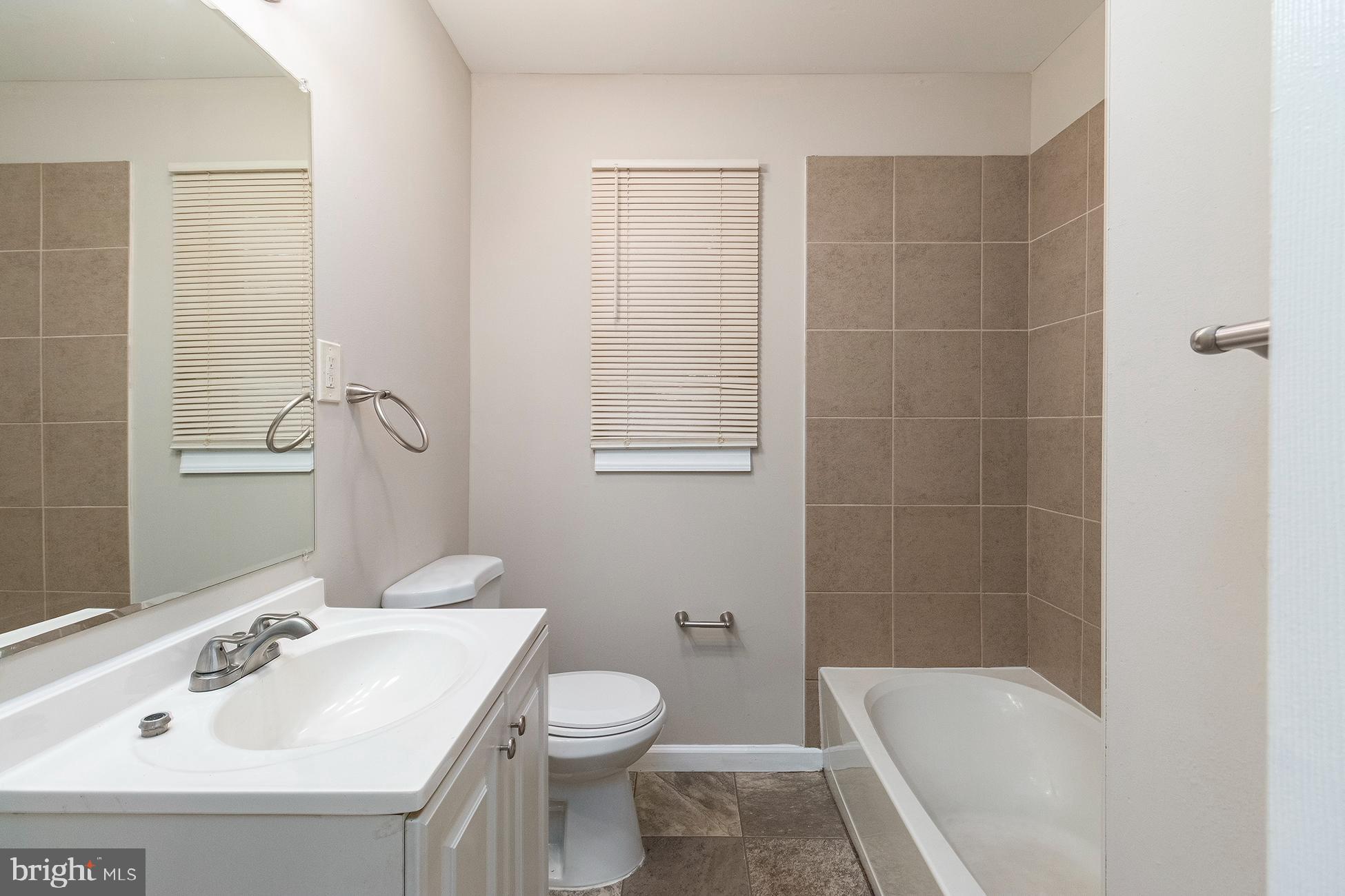 205 Starling Lane Mount Holly, NJ 08060 - Photo 9 of 21 a bathroom with a sink toilet and shower