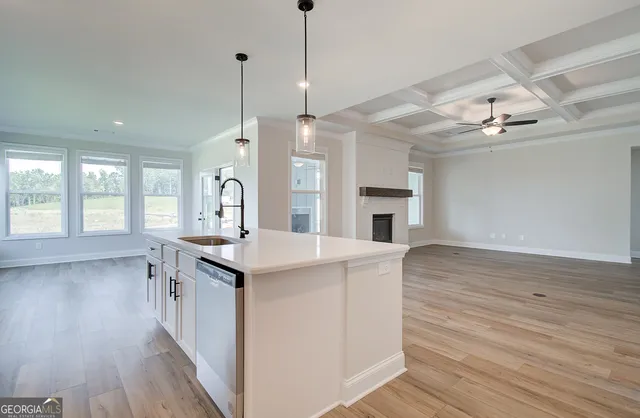 a view of a hallway with seating area