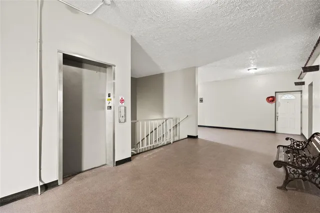 a view of building with yard