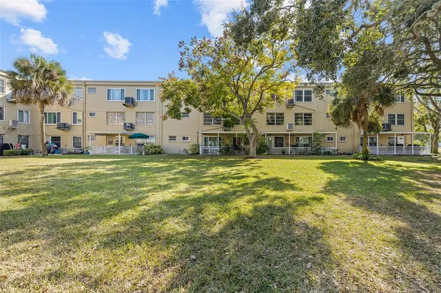 a view of a car park in front of a building