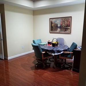 2177 Alum Rock Avenue, Unit 211 San Jose, CA 95116 - Photo 20 of 46 a view of a dining room with furniture and wooden floor