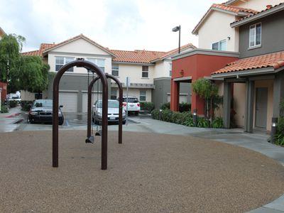2177 Alum Rock Avenue, Unit 211 San Jose, CA 95116 - Photo 23 of 46 a front view of a house with garden