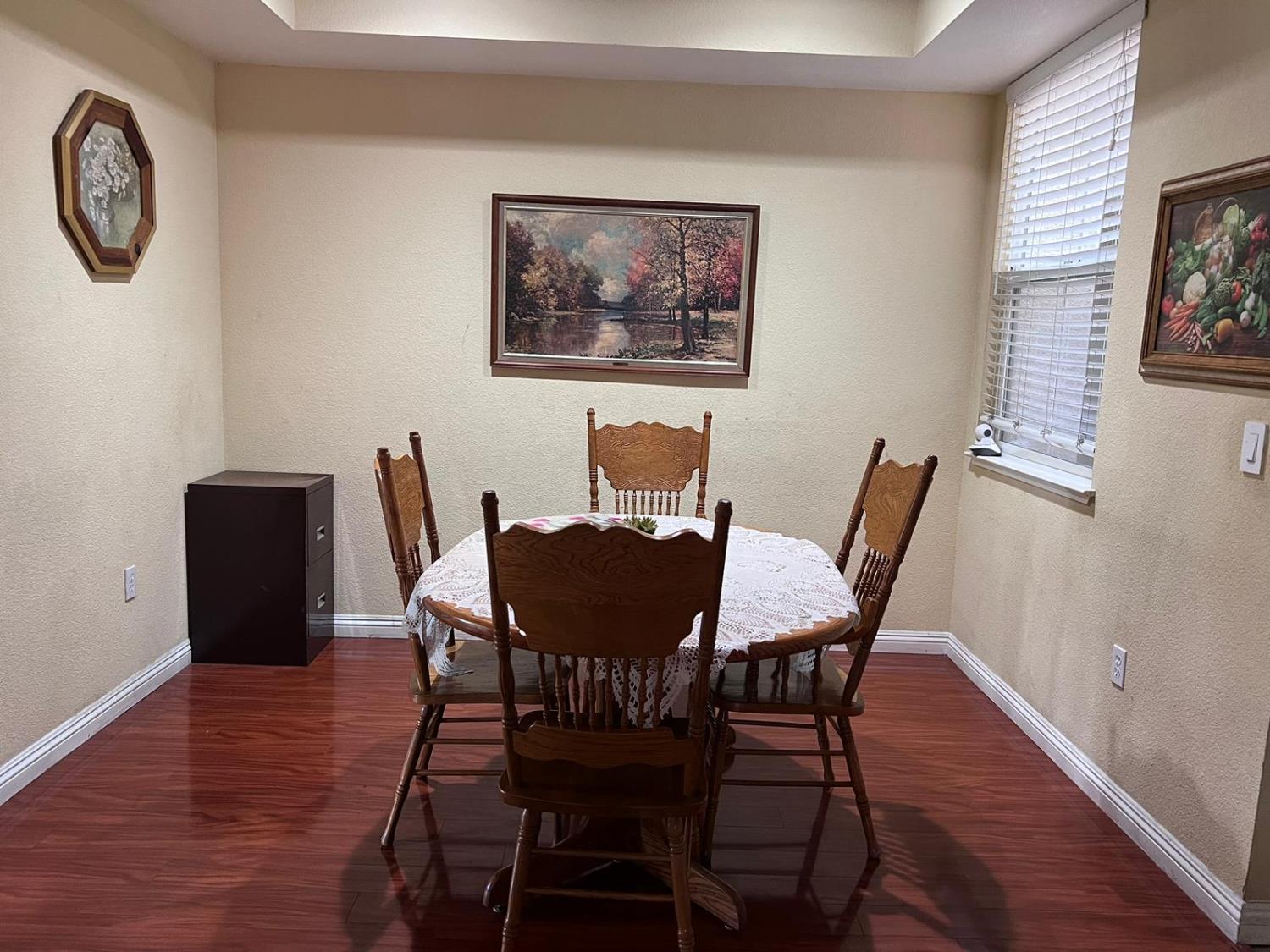 2177 Alum Rock Avenue, Unit 211 San Jose, CA 95116 - Photo 4 of 46 a view of a dining room with furniture window and wooden floor