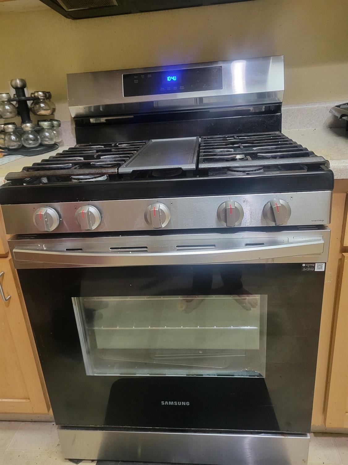 2177 Alum Rock Avenue, Unit 211 San Jose, CA 95116 - Photo 43 of 46 a stove top oven sitting inside of a kitchen