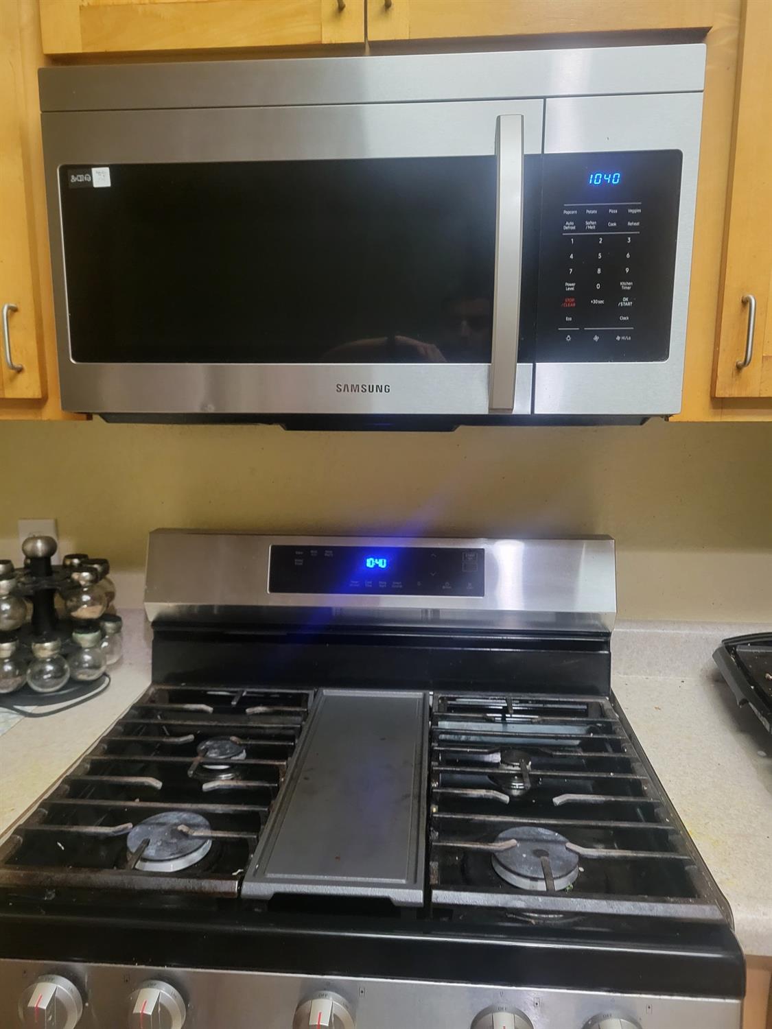 2177 Alum Rock Avenue, Unit 211 San Jose, CA 95116 - Photo 45 of 46 a stove top oven sitting inside of a kitchen